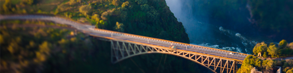 bridge for cars linking mountains